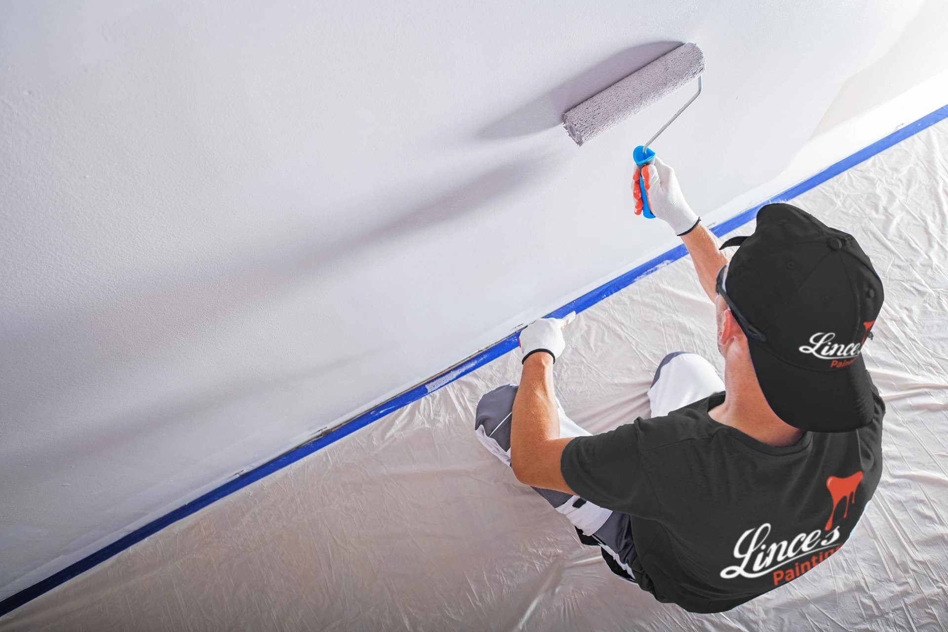 Lince’s Painting crew member discussing a project with a homeowner.